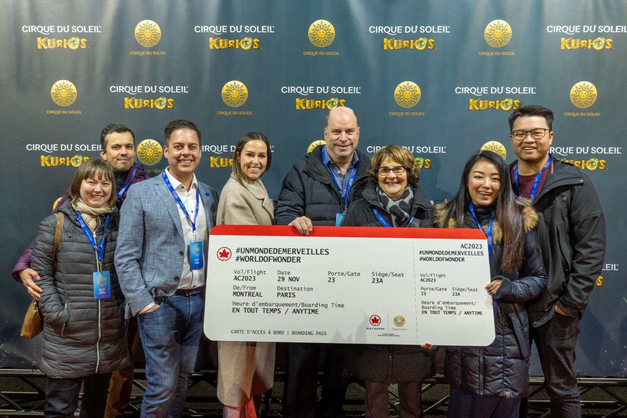 Group celebrating a presentation at a corporate event